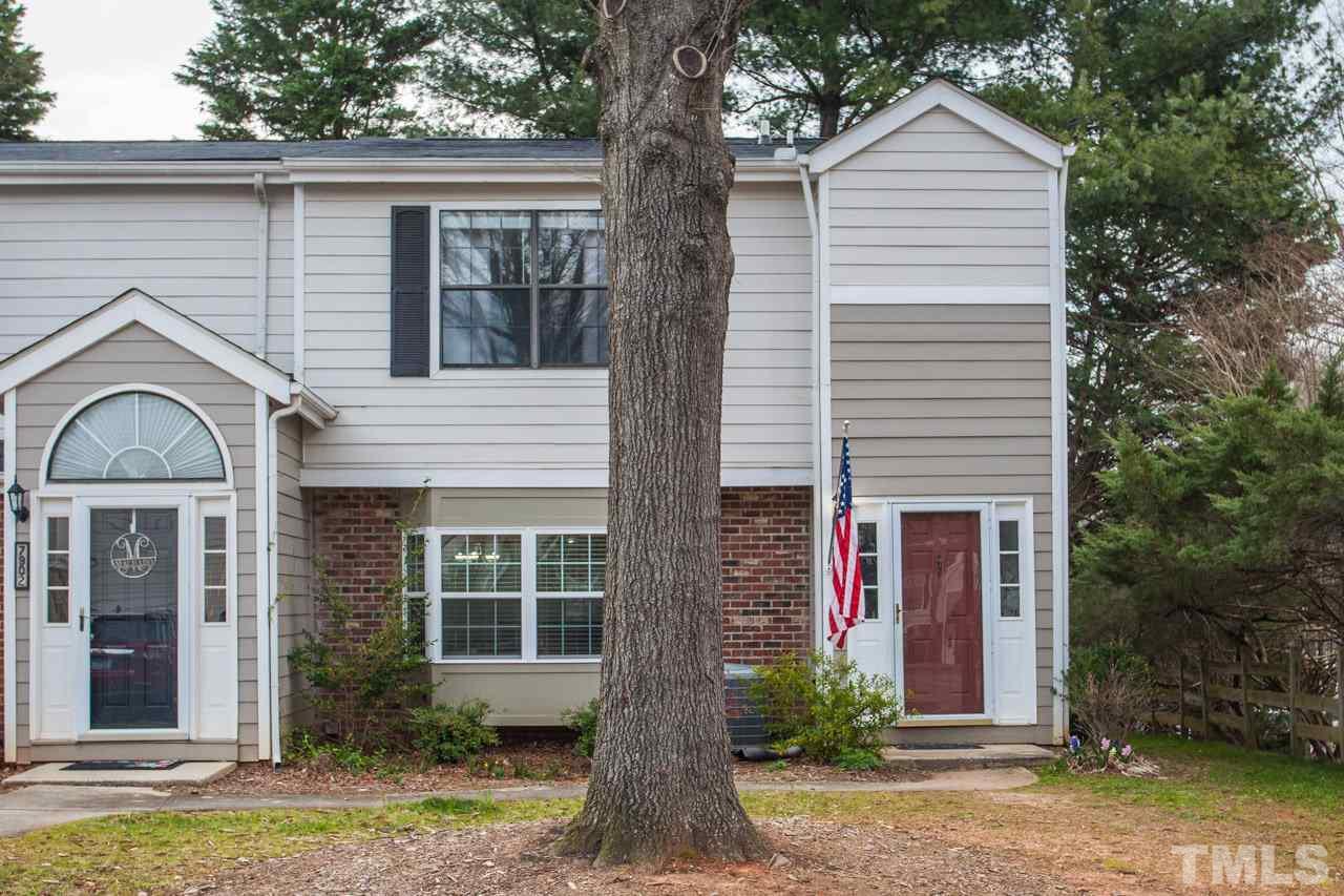 7900 Falcon Rest Circle, Unit 10 Raleigh, NC 27615 - Photo 1 of 25 a front view of a house with garden