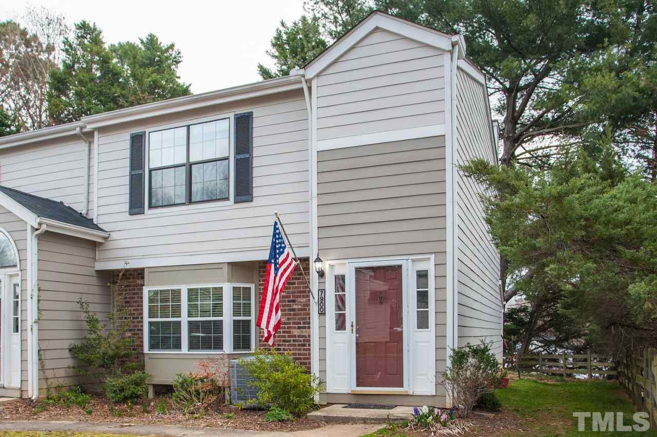 7900 Falcon Rest Circle, Unit 10 Raleigh, NC 27615 - Photo 3 of 25 a view of a house with a yard and potted plants