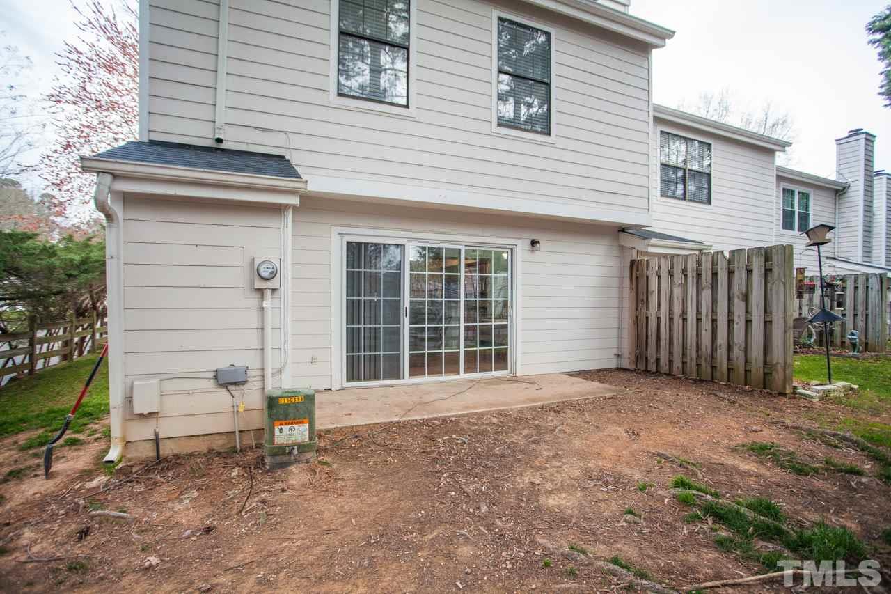 7900 Falcon Rest Circle, Unit 10 Raleigh, NC 27615 - Photo 23 of 25 a front view of a house with a large window