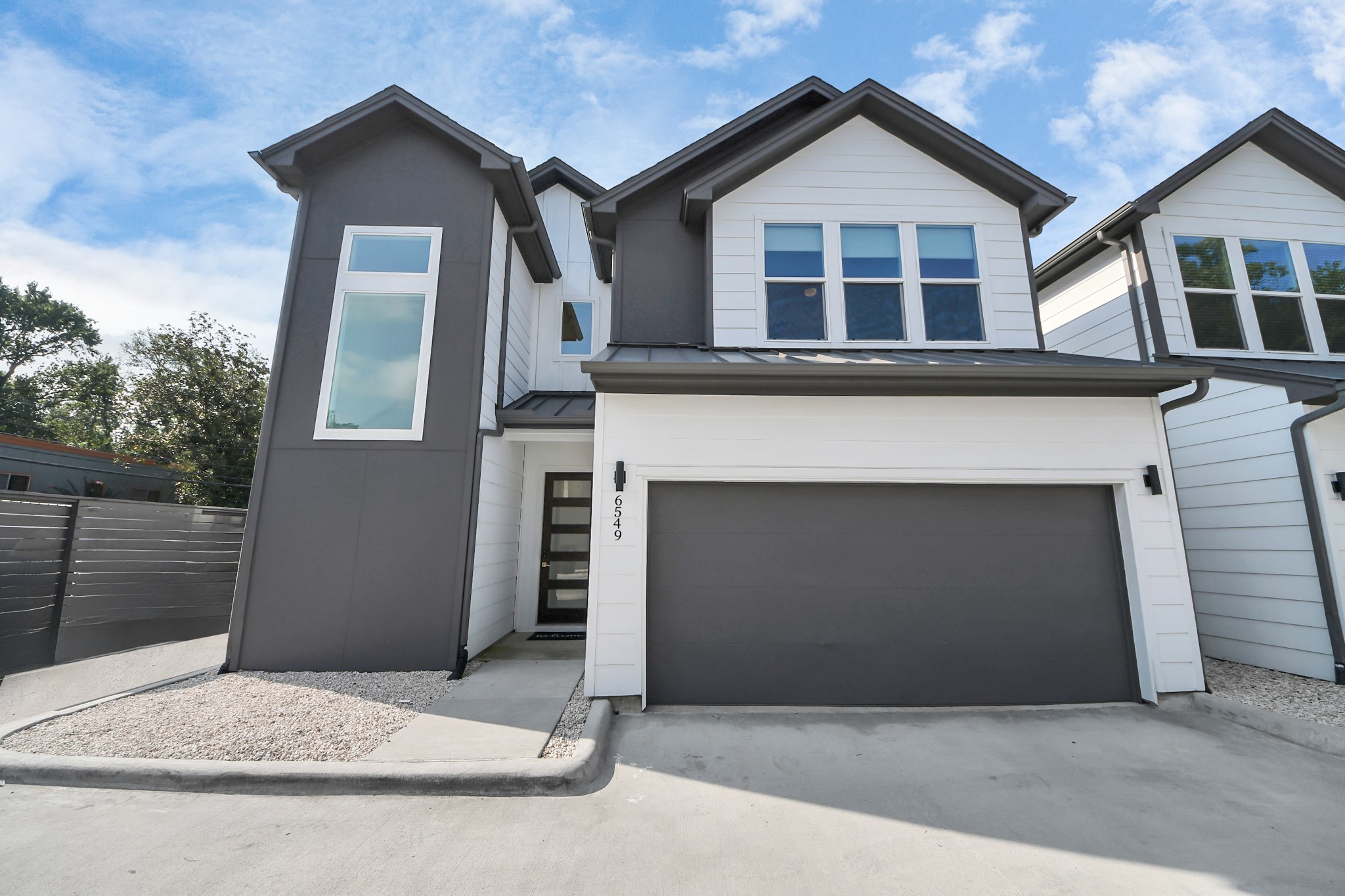 6549 Sealey Street Houston, TX 77091 - Photo 35 of 40 a front view of a house with a garage
