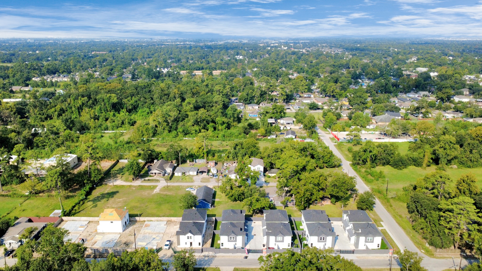 6549 Sealey Street Houston, TX 77091 - Photo 39 of 40 an aerial view of residential houses with outdoor space and trees