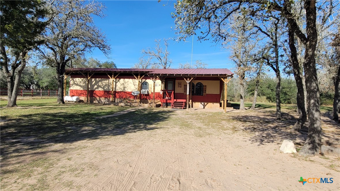 127-129 McAdams Road Goliad, TX 77963 - Photo 32 of 33 a view of a park with swings and slides