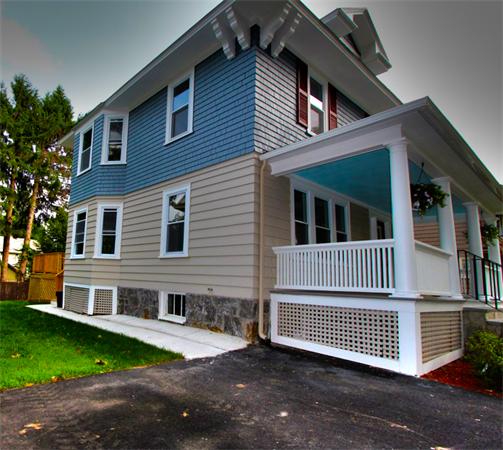 28 Woodman Road Worcester, MA 01602 - Photo 4 of 30 a front view of a house with a garden