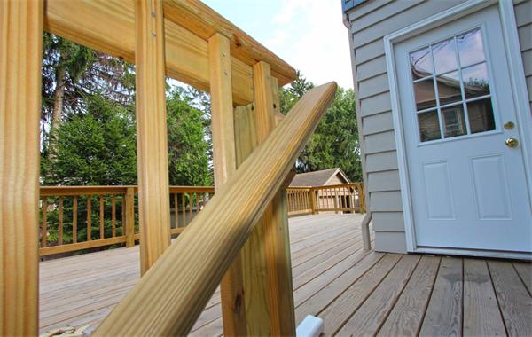 28 Woodman Road Worcester, MA 01602 - Photo 5 of 30 a view of balcony with wooden floor and fence