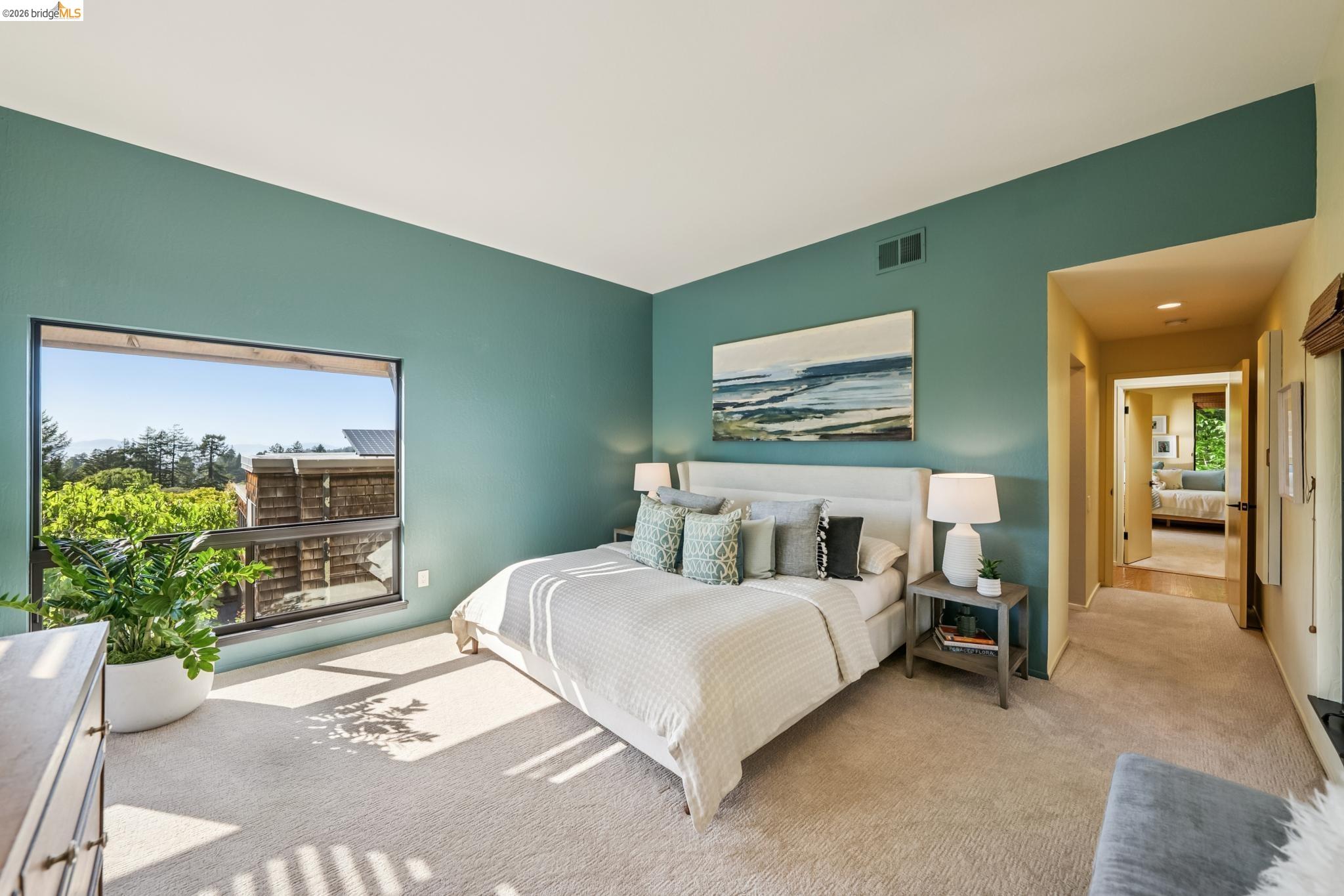 576 Vistamont Avenue Berkeley, CA 94708 - Photo 20 of 33 Expansive bedroom featuring a large picture window, plush carpeting, and a recessed ceiling vent
