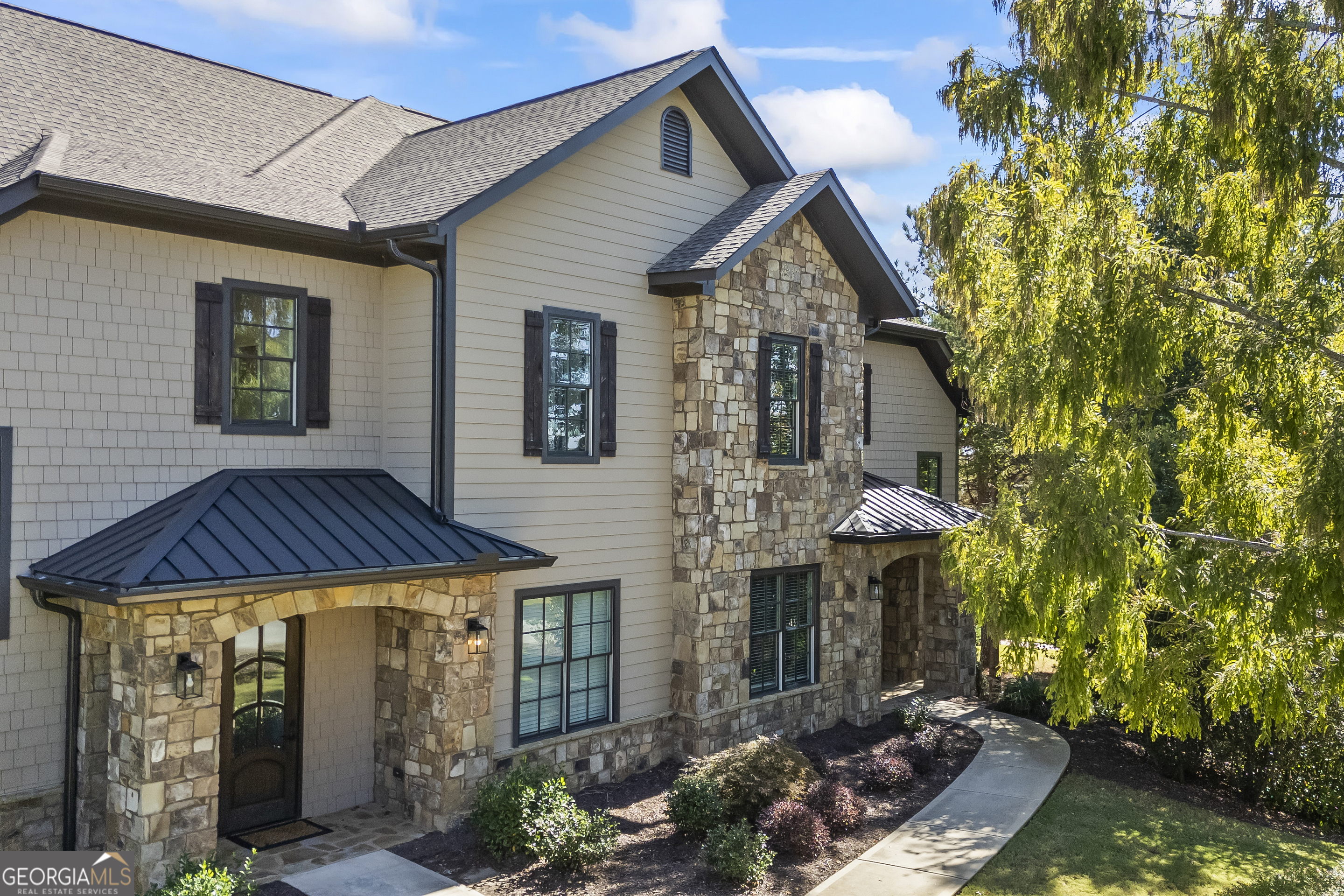 a front view of a house with a yard