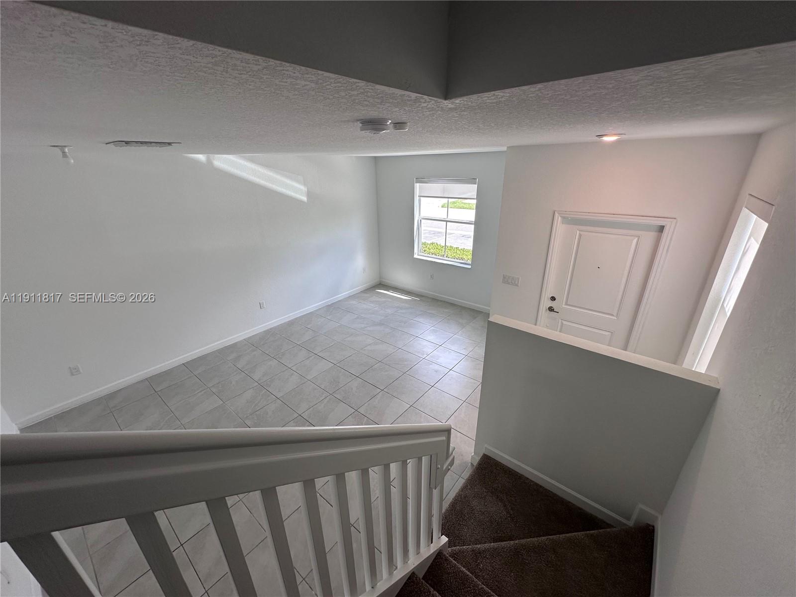 1884 Southeast 27th Street Homestead, FL 33035 - Photo 17 of 34 a view of a hallway