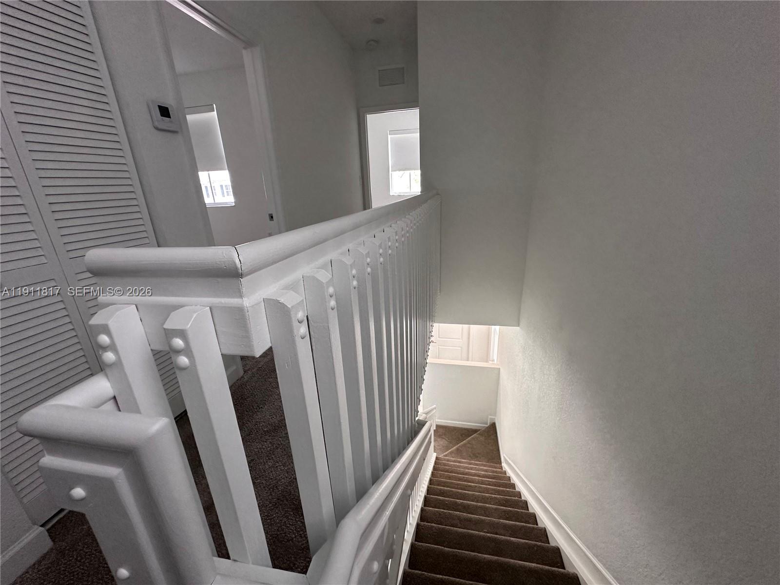 1884 Southeast 27th Street Homestead, FL 33035 - Photo 18 of 34 a view of a hallway with entryway