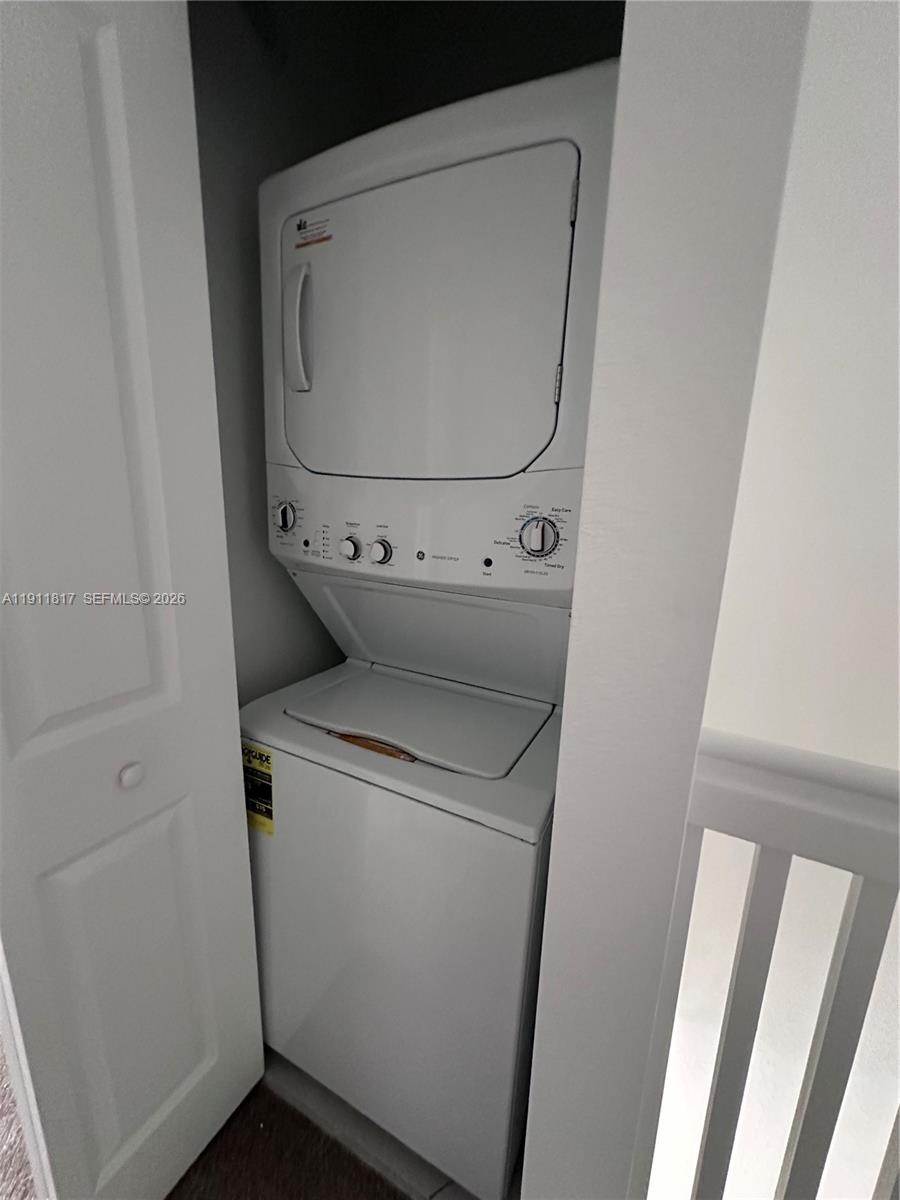 1884 Southeast 27th Street Homestead, FL 33035 - Photo 20 of 34 a utility room with dryer and washer