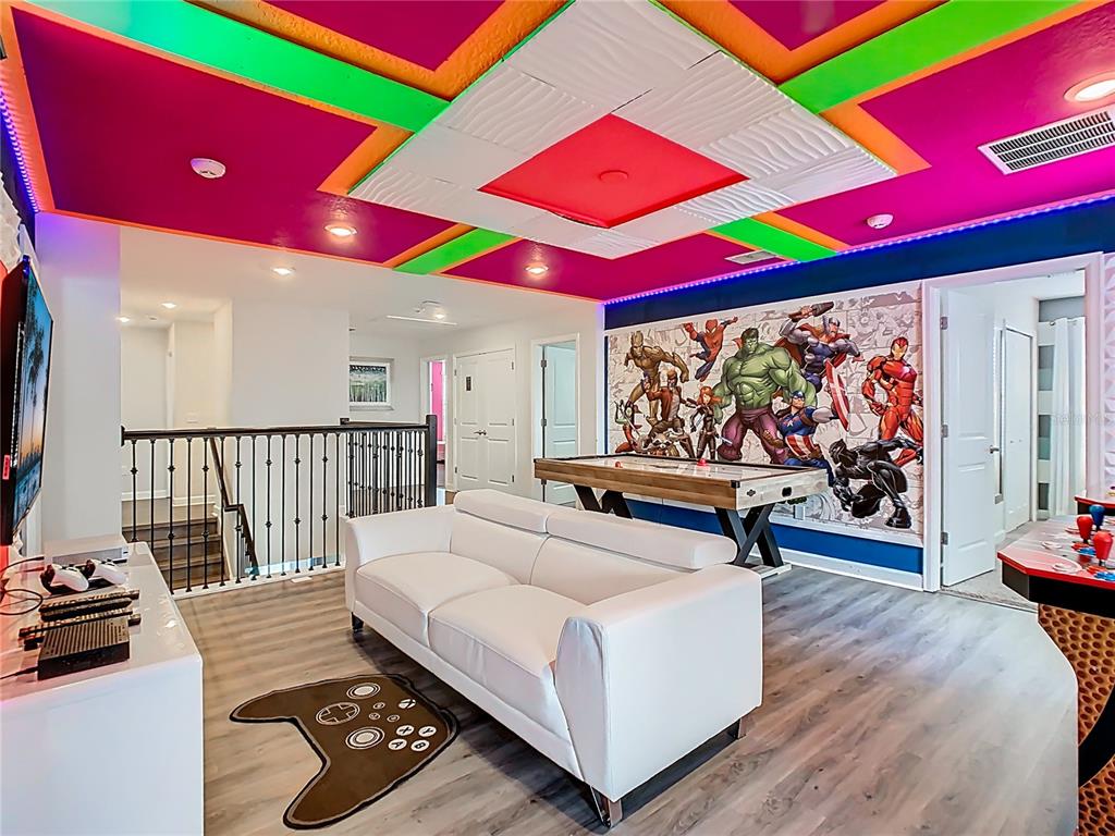 2925 Fable Street Kissimmee, FL 34746 - Photo 19 of 56 a living room with furniture and a flat screen tv