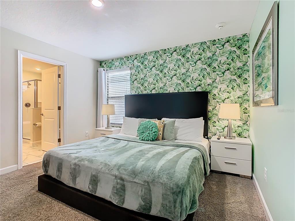 2925 Fable Street Kissimmee, FL 34746 - Photo 23 of 56 a bedroom with a large bed and a window