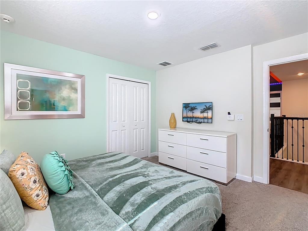 2925 Fable Street Kissimmee, FL 34746 - Photo 24 of 56 a bedroom with a bed and window