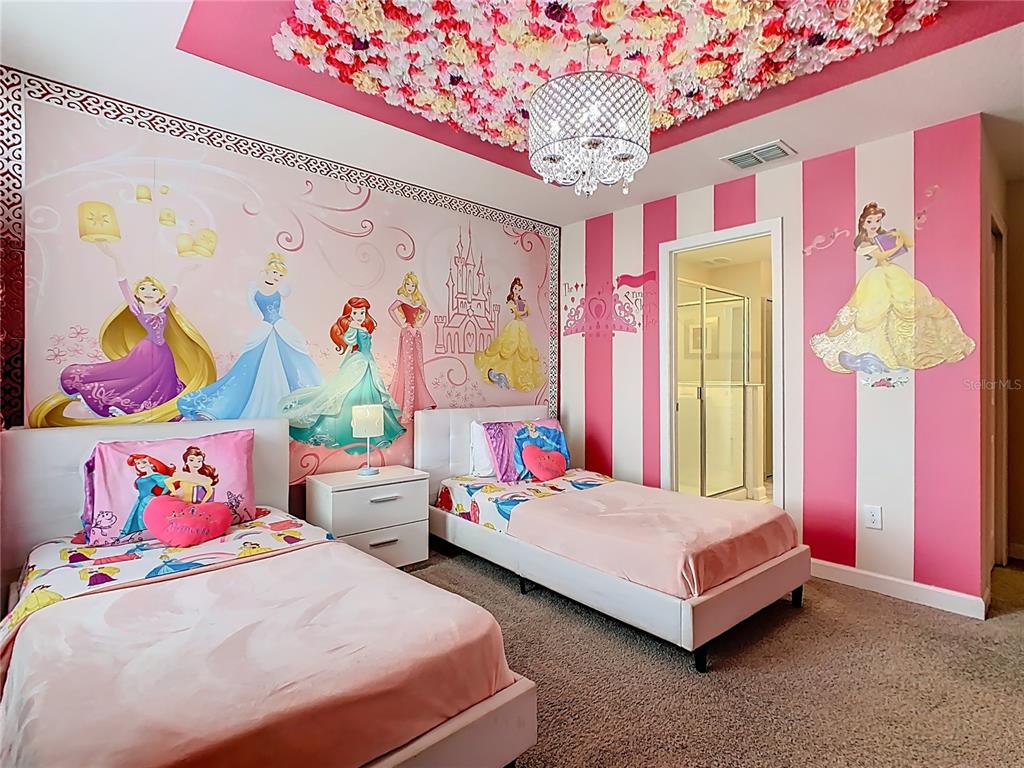 2925 Fable Street Kissimmee, FL 34746 - Photo 25 of 56 a bedroom with bed and window