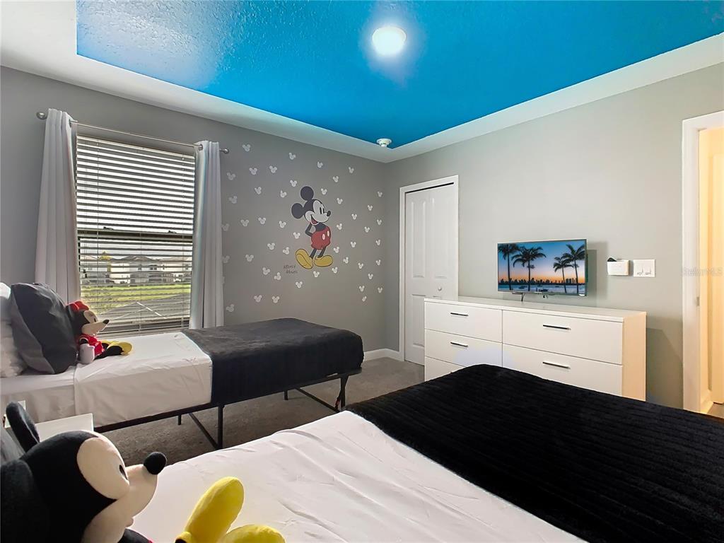 2925 Fable Street Kissimmee, FL 34746 - Photo 28 of 56 a living room with furniture and a fireplace