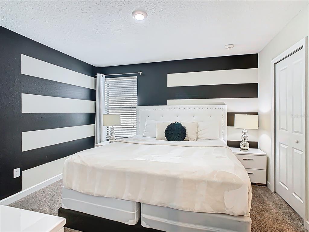 2925 Fable Street Kissimmee, FL 34746 - Photo 32 of 56 a large white bed in a white room