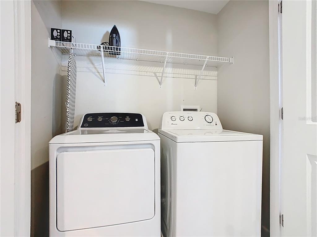 2925 Fable Street Kissimmee, FL 34746 - Photo 46 of 56 a utility room with dryer and washer