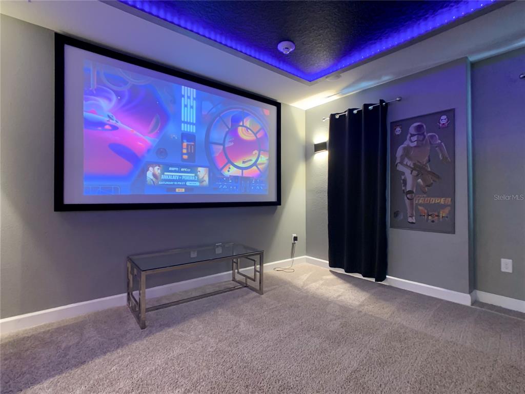 2925 Fable Street Kissimmee, FL 34746 - Photo 49 of 56 a view of a room with furniture and wall paintings