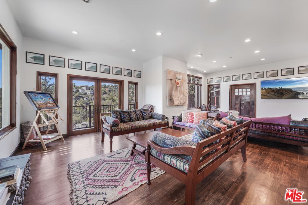 458 Rustic Drive Los Angeles, CA 90065 - Photo 16 of 41 a living room with furniture and a flat screen tv