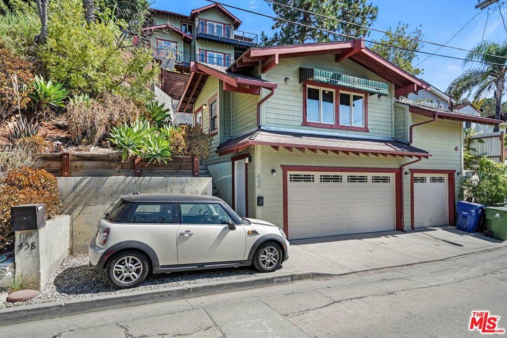 458 Rustic Drive Los Angeles, CA 90065 - Photo 21 of 41 a front view of a house with parking