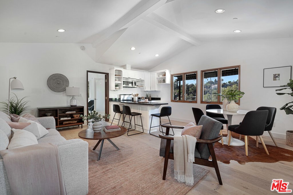 458 Rustic Drive Los Angeles, CA 90065 - Photo 22 of 41 a living room with furniture and a large window