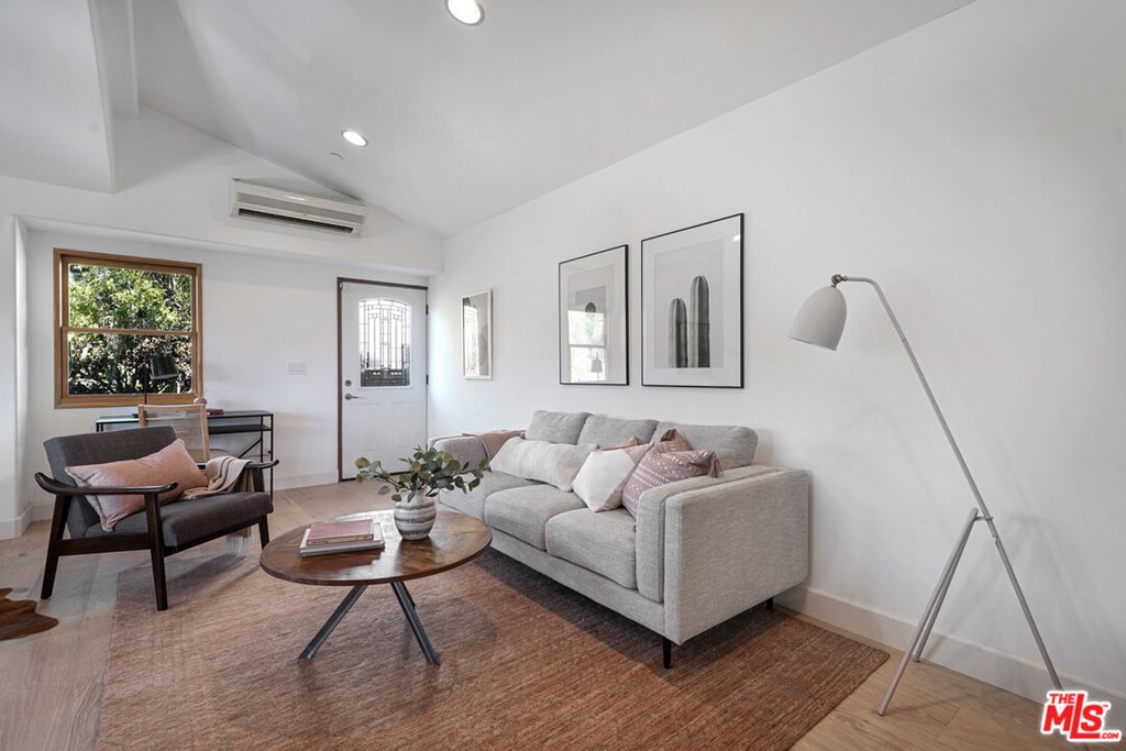 458 Rustic Drive Los Angeles, CA 90065 - Photo 23 of 41 a living room with furniture and a potted plant
