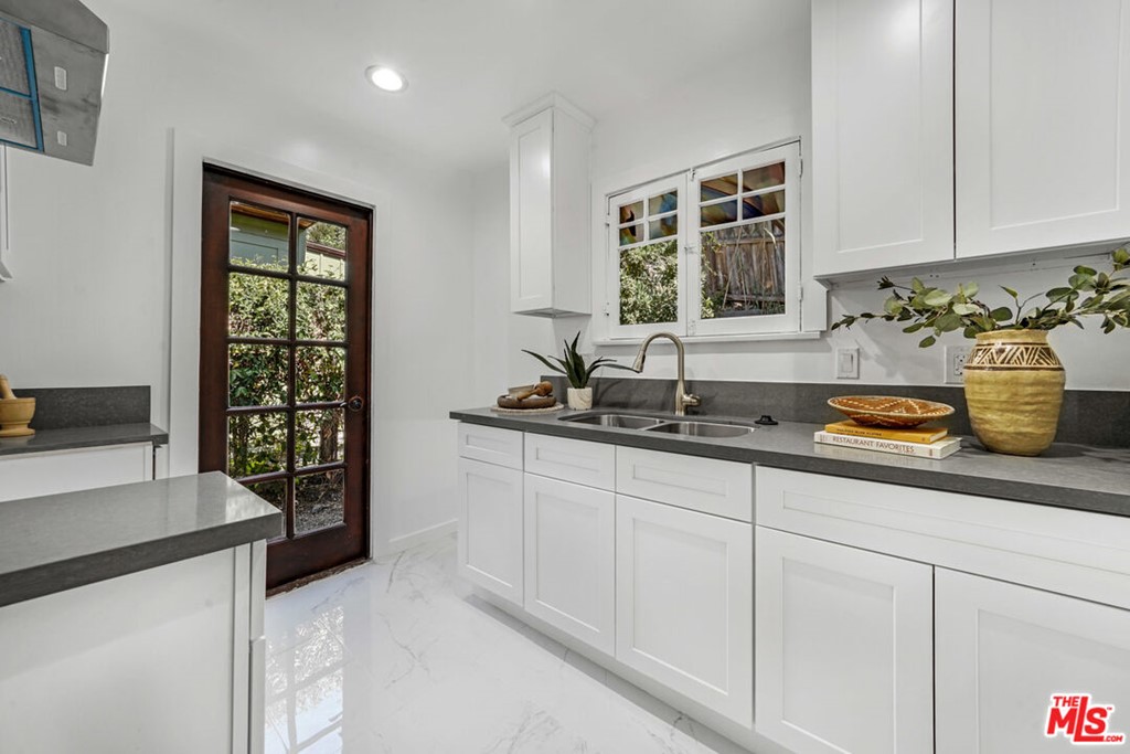 458 Rustic Drive Los Angeles, CA 90065 - Photo 41 of 41 a kitchen with a sink and a window