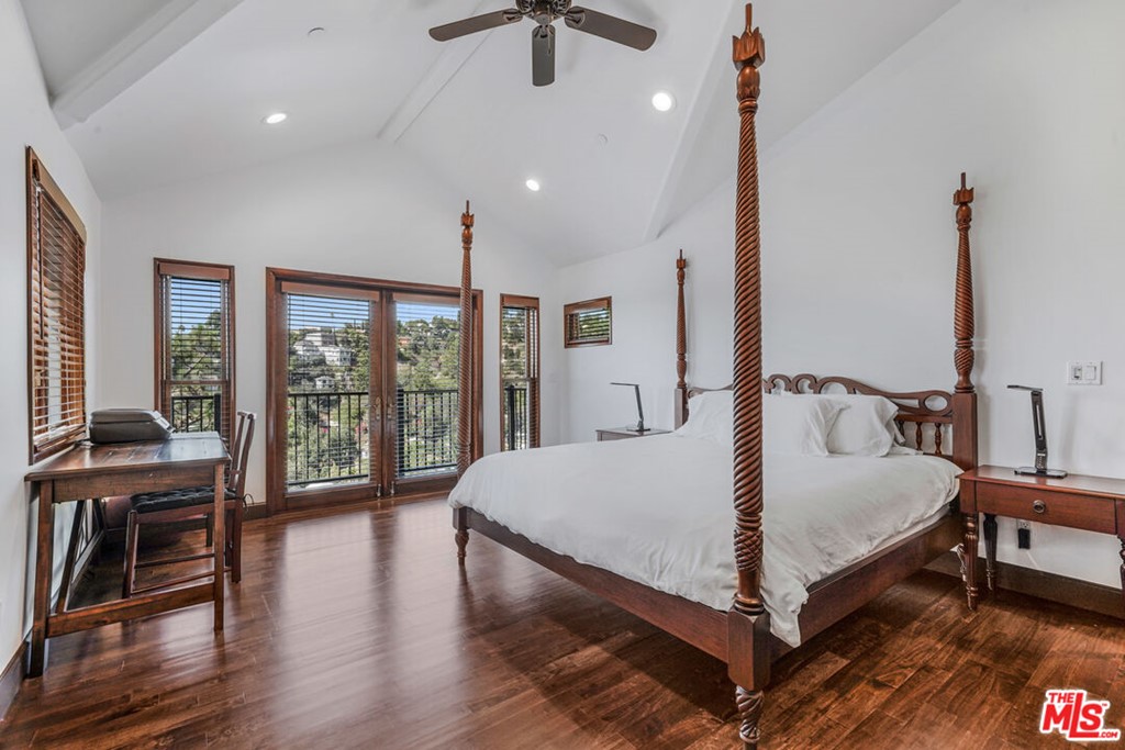 458 Rustic Drive Los Angeles, CA 90065 - Photo 9 of 41 a bed sitting in a room next to a window