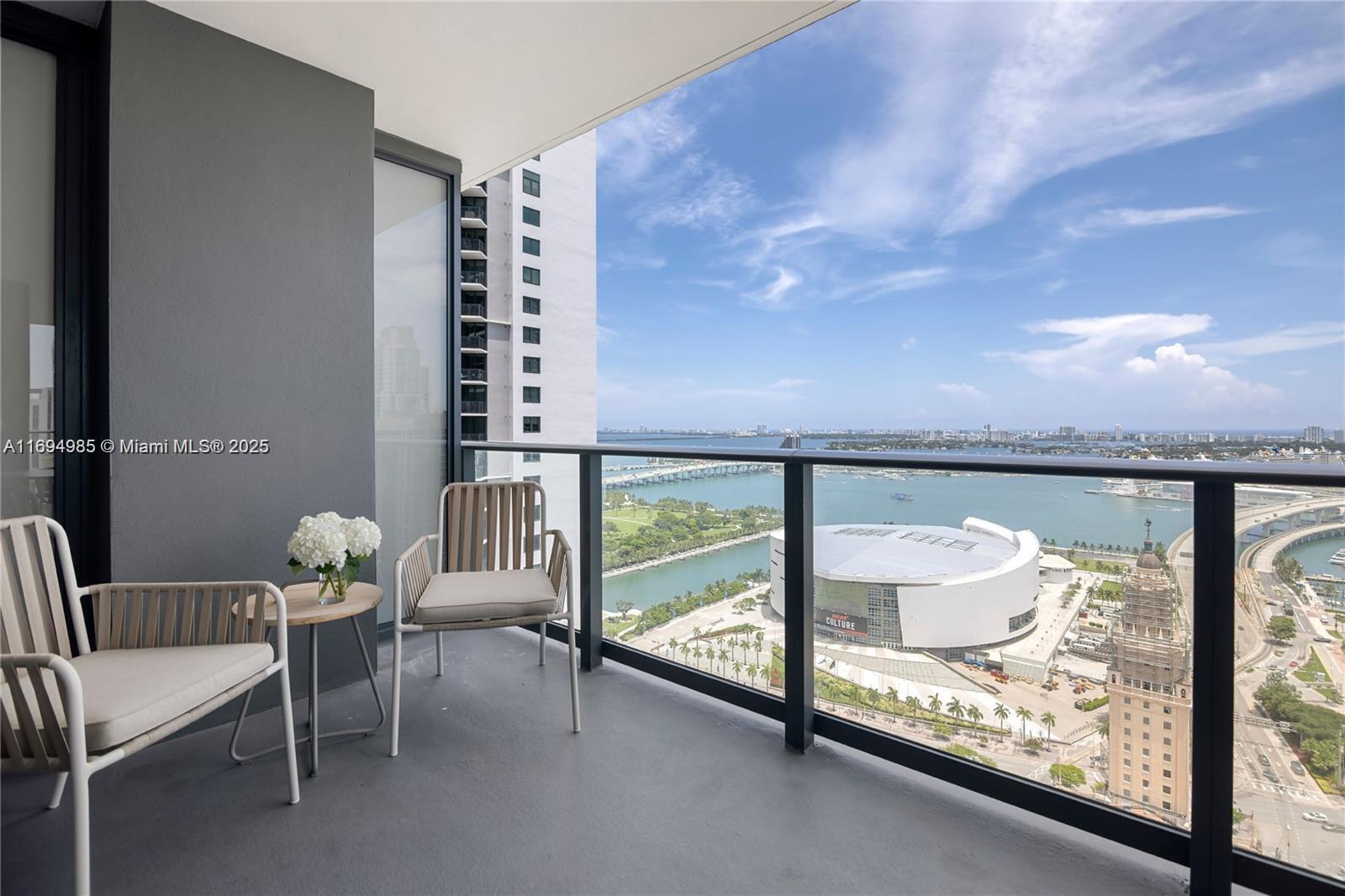 159 Northeast 6th Street, Unit 2916 Miami, FL 33132 - Photo 35 of 44 a view of a balcony with chair