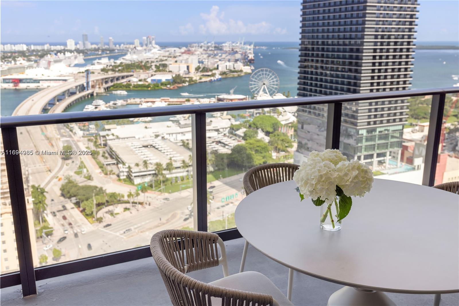 159 Northeast 6th Street, Unit 2916 Miami, FL 33132 - Photo 37 of 44 a view of a dining room with furniture window and outside view