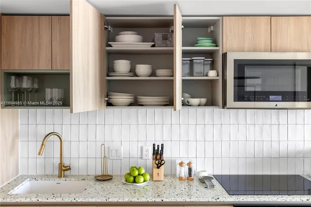 a bathroom with a sink and a bathtub