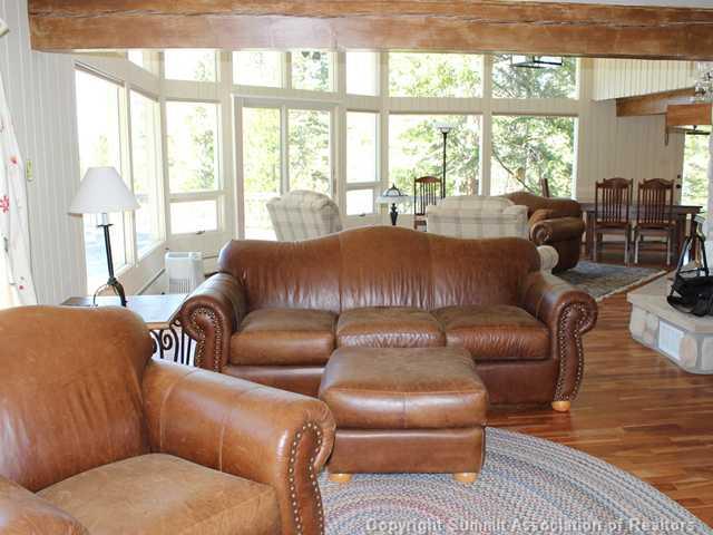 576 Moonstone Road Breckenridge, CO 80424 - Photo 11 of 22 a living room with furniture and a large window
