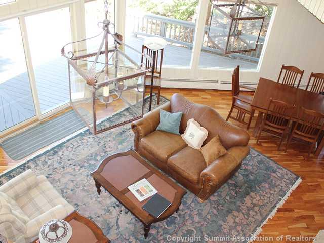 576 Moonstone Road Breckenridge, CO 80424 - Photo 10 of 22 a living room with furniture and a rug
