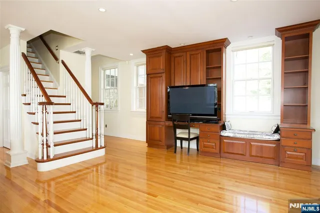 a view of a dining room with furniture and window