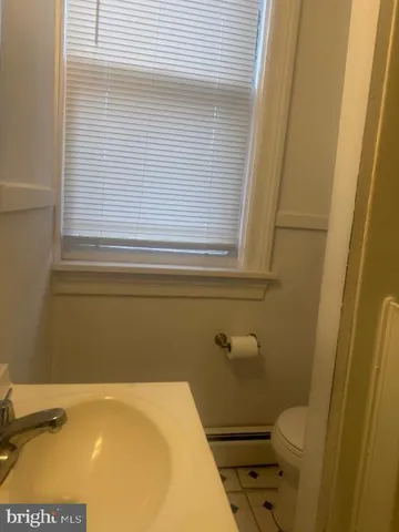 a bathroom with a sink and a toilet