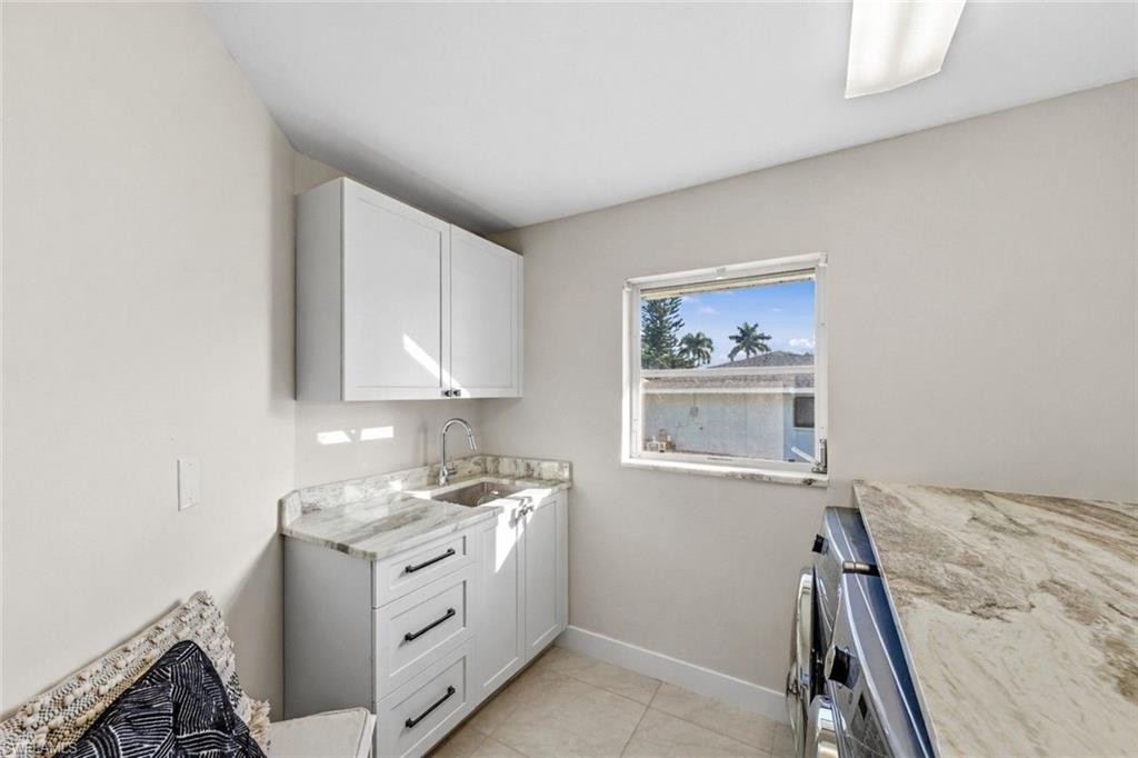 4724 Riverside Drive Estero, FL 33928 - Photo 26 of 44 a room with storage and utility