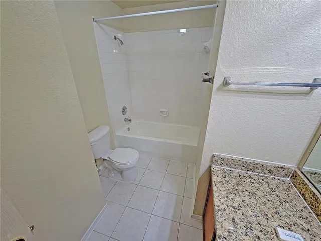 a view of a backyard with a small cabin