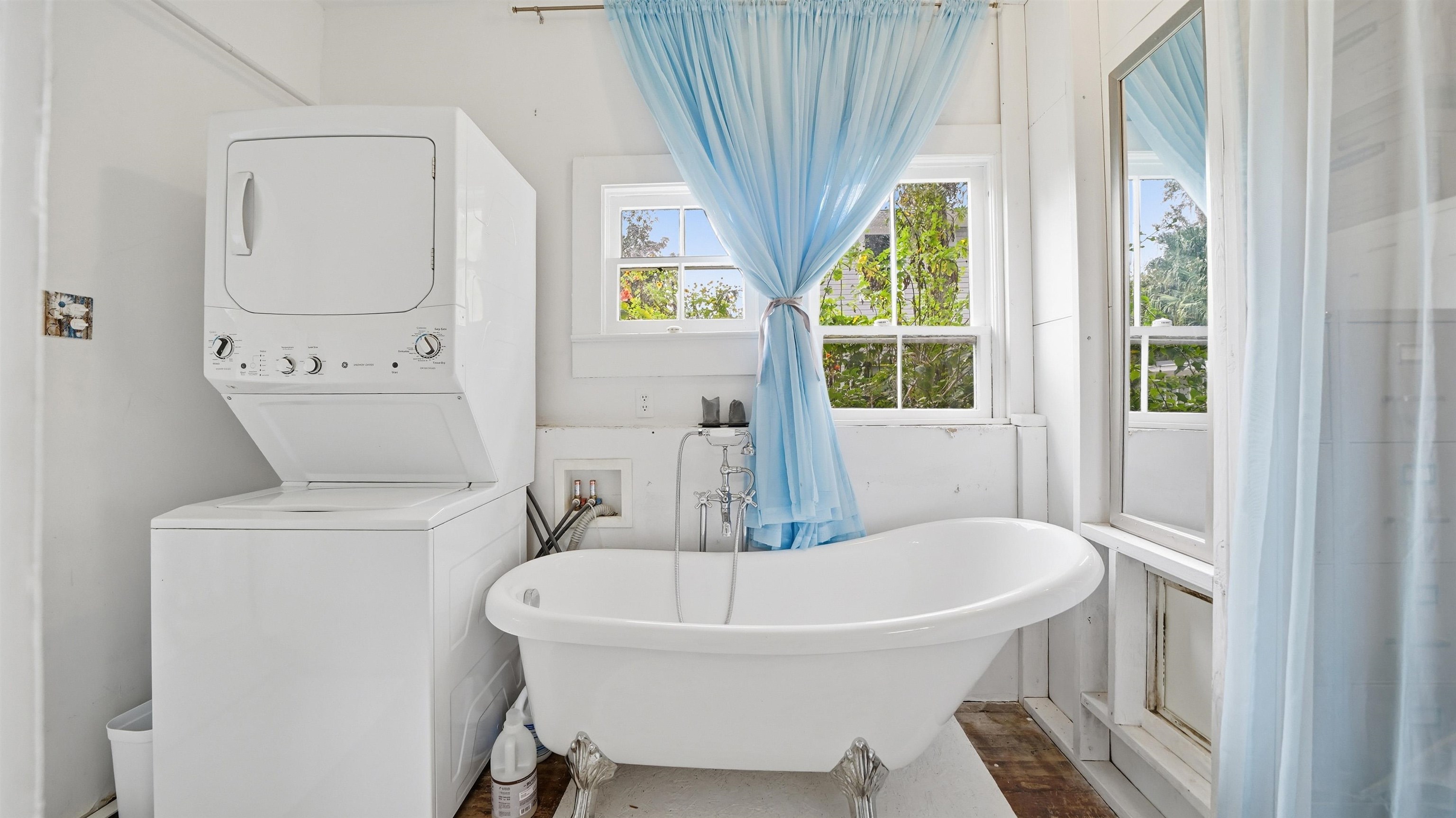 15 Davis Street St. Augustine, FL 32084 - Photo 19 of 48 a white bath tub sitting next to a white sink