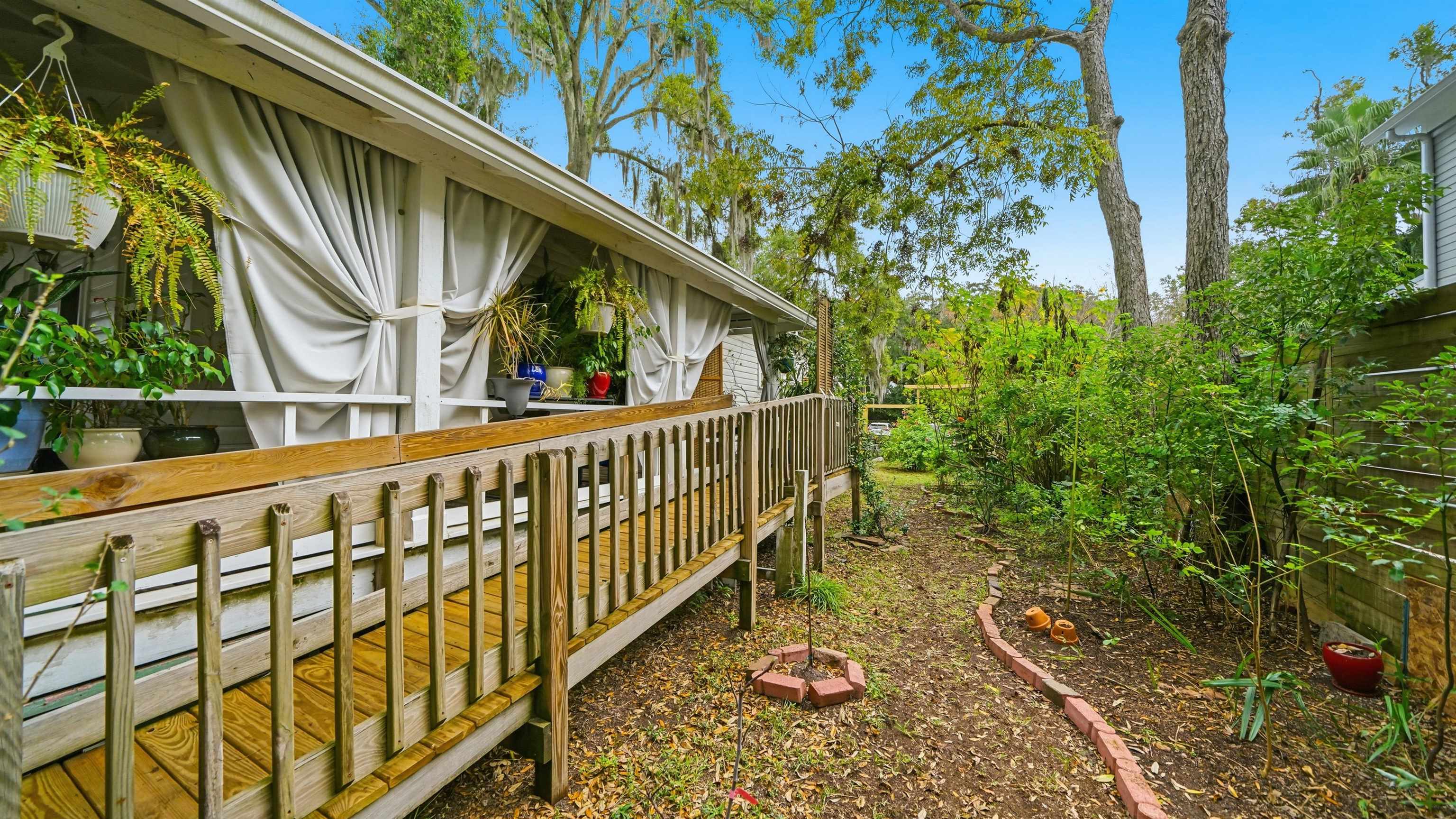 15 Davis Street St. Augustine, FL 32084 - Photo 30 of 48 a view of a house with a small yard