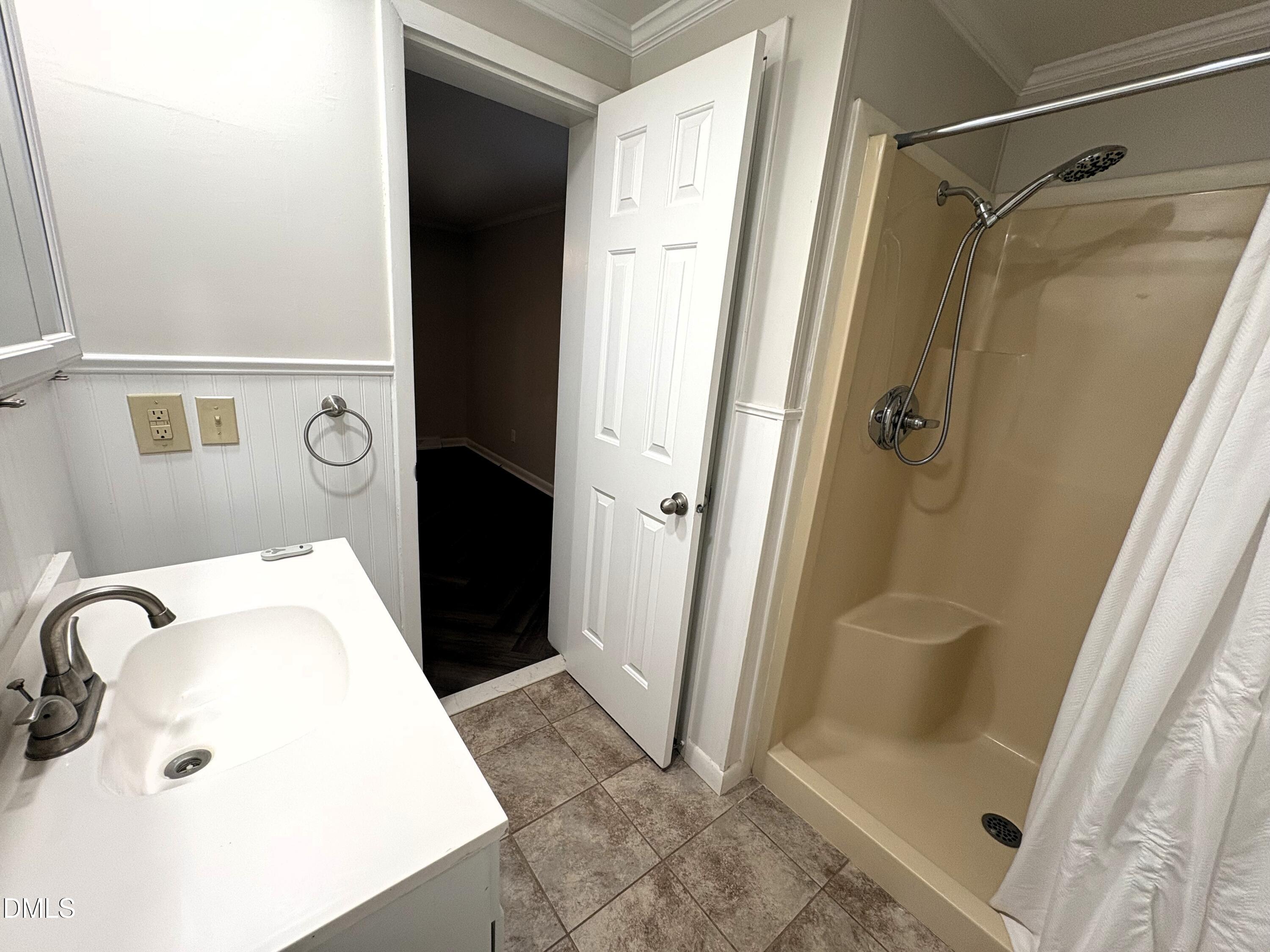 6100 Guess Road Rougemont, NC 27572 - Photo 33 of 35 a bathroom with a sink and a shower