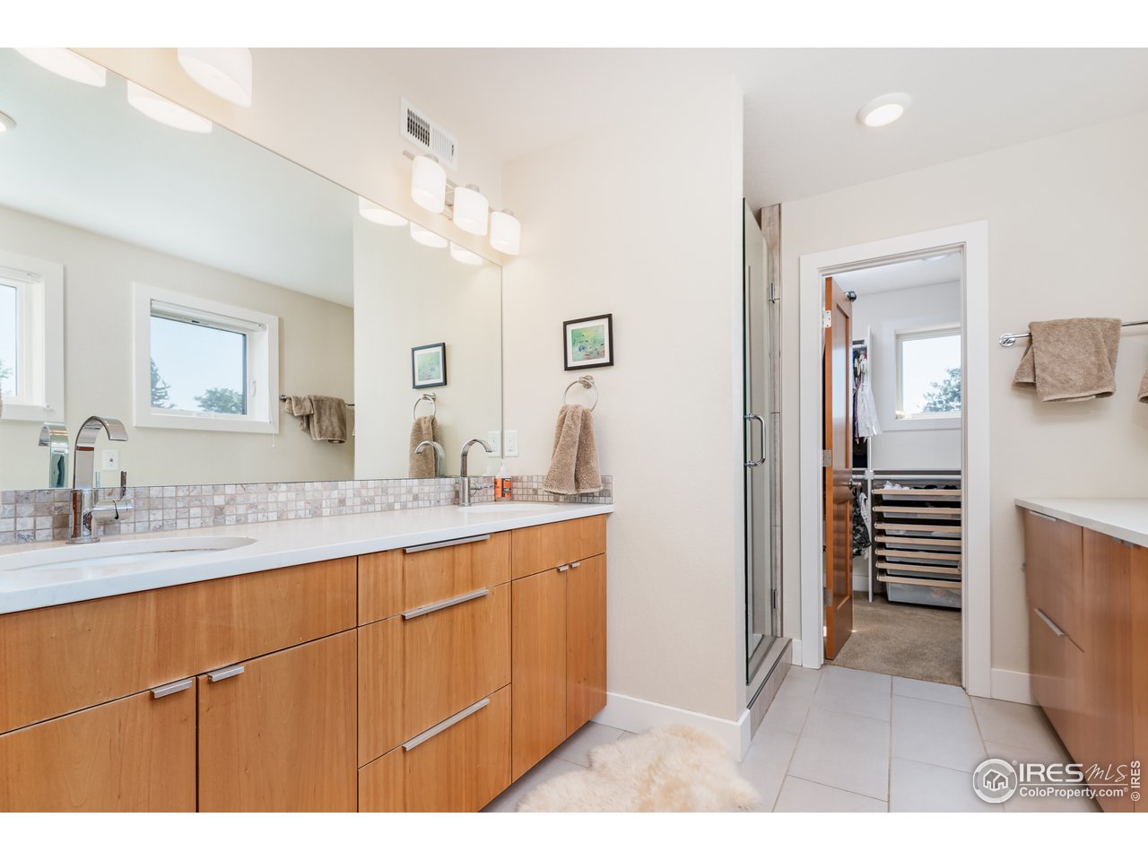 1229 Cedar Avenue Boulder, CO 80304 - Photo 15 of 29 a bathroom with a sink a mirror and a toilet