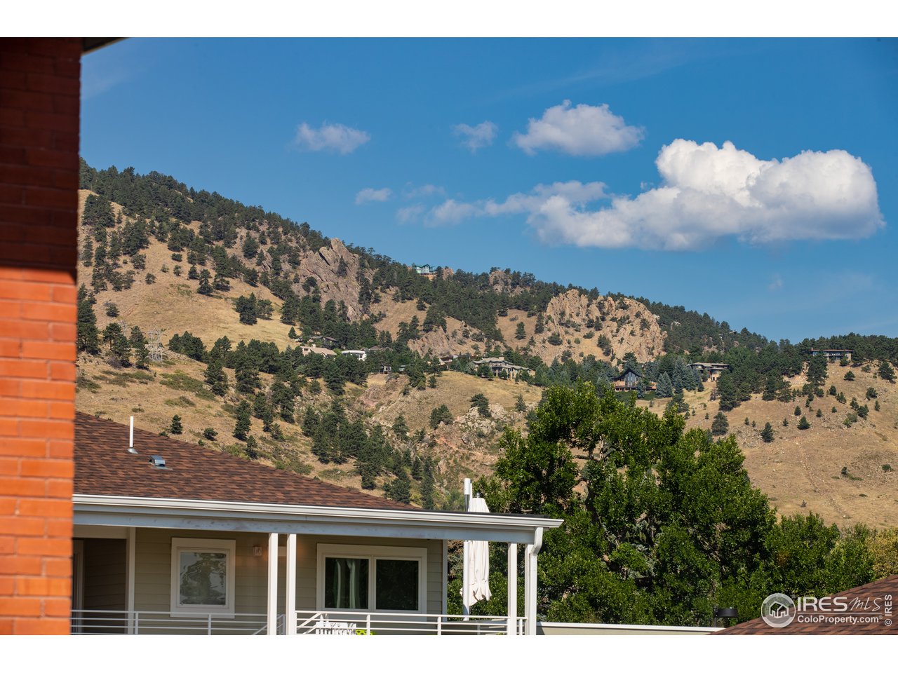 1229 Cedar Avenue Boulder, CO 80304 - Photo 17 of 29 a view of houses with sky view