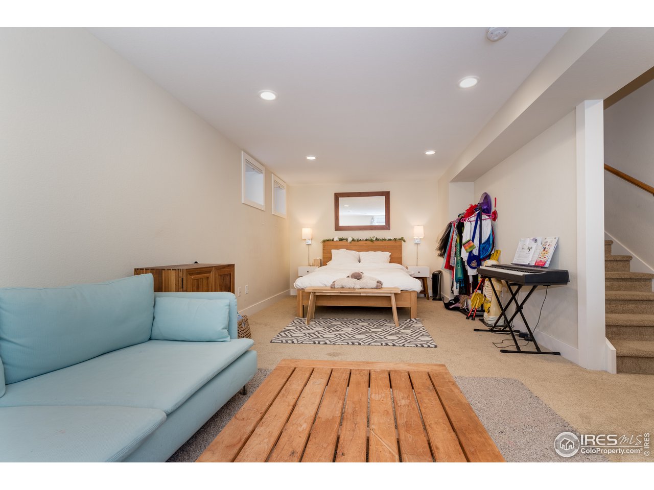 1229 Cedar Avenue Boulder, CO 80304 - Photo 20 of 29 a living room with furniture and a rug