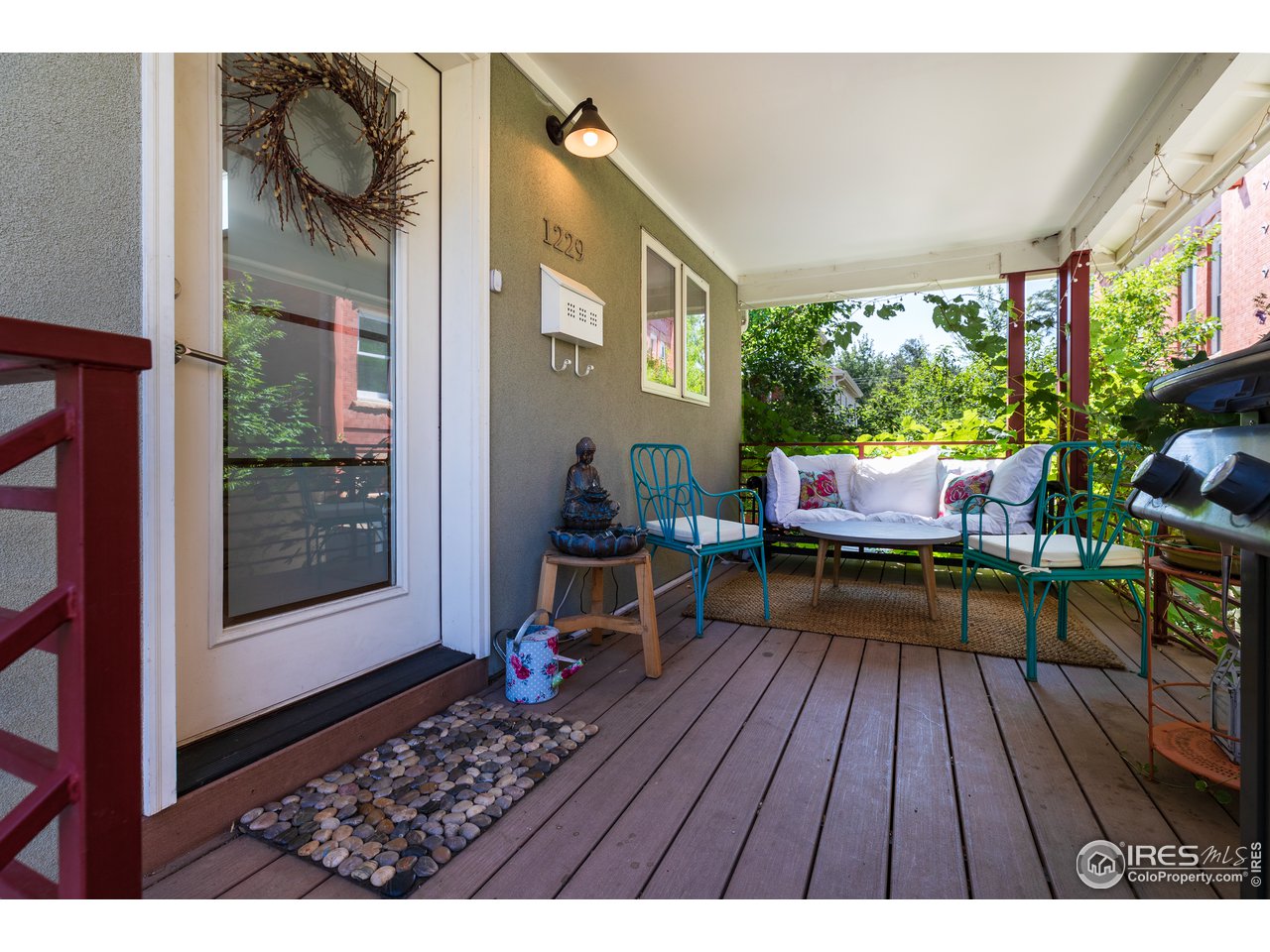 1229 Cedar Avenue Boulder, CO 80304 - Photo 21 of 29 a outdoor living space with furniture and a rug