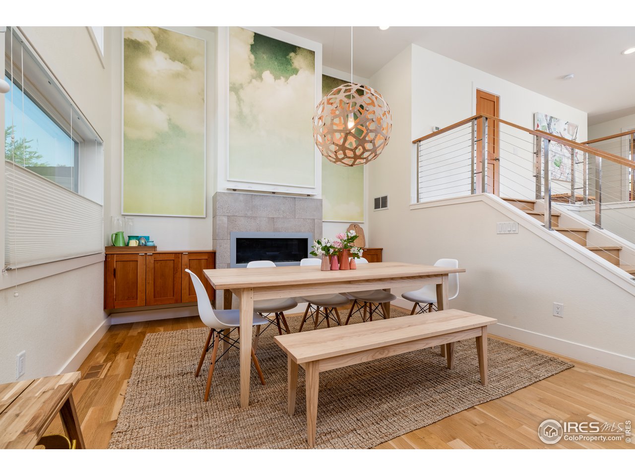 1229 Cedar Avenue Boulder, CO 80304 - Photo 5 of 29 a view of a dining room with furniture and wooden floor