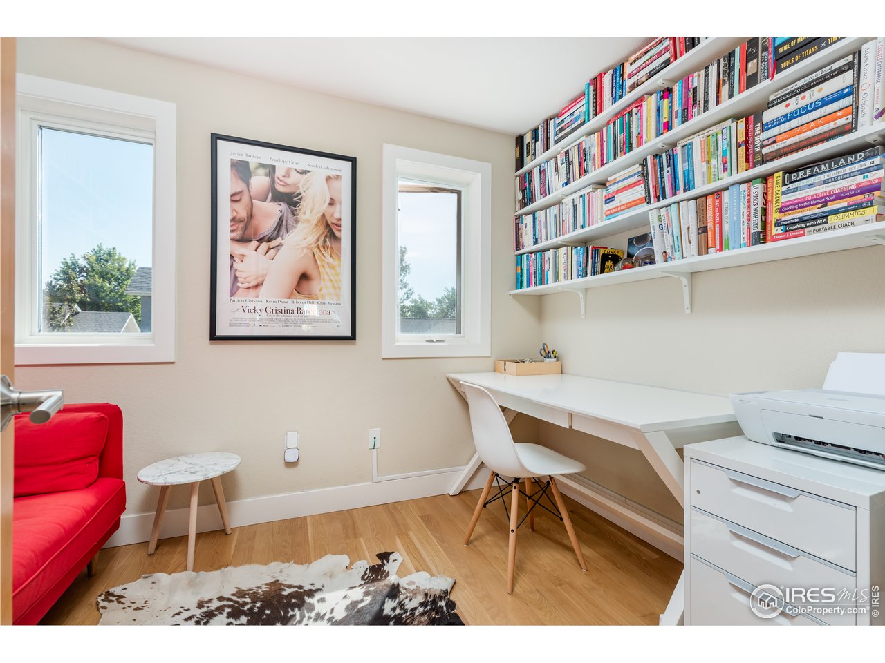1229 Cedar Avenue Boulder, CO 80304 - Photo 8 of 29 a view of a workspace with furniture and wooden floor
