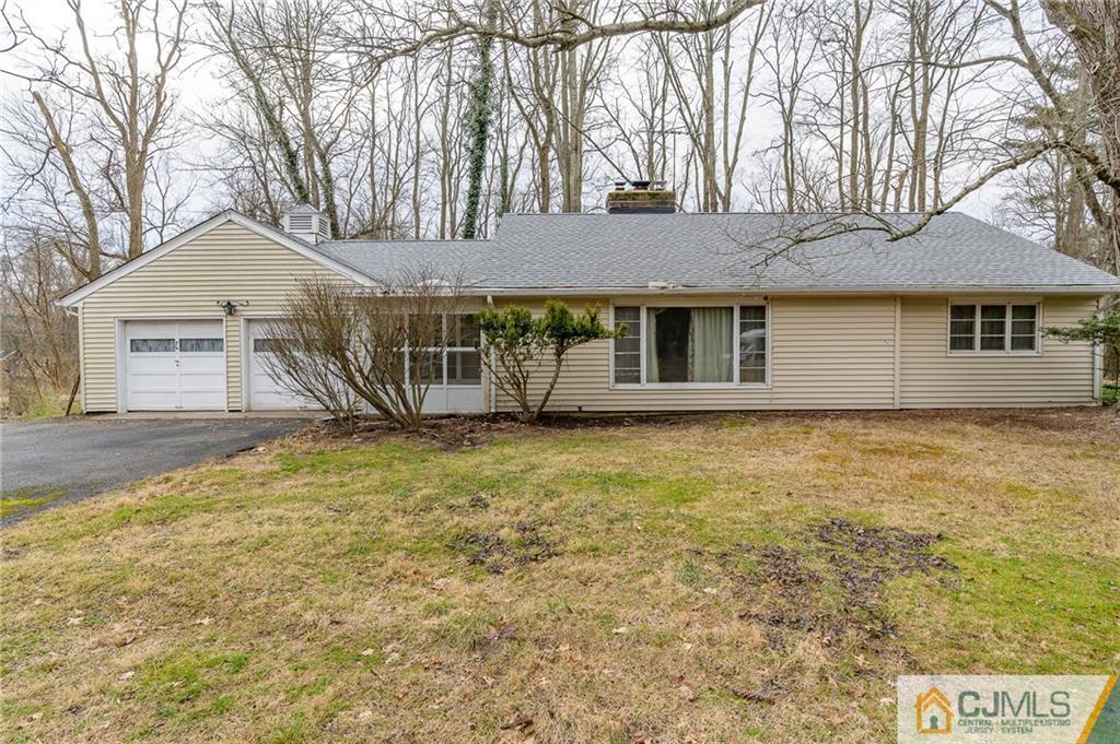 185 Carter Road Princeton, NJ 08540 - Photo 1 of 21 a front view of a house with a yard