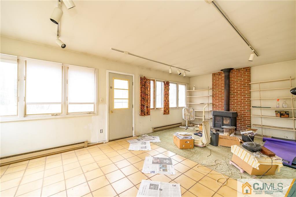 185 Carter Road Princeton, NJ 08540 - Photo 11 of 21 a view of a livingroom with furniture window and outside view