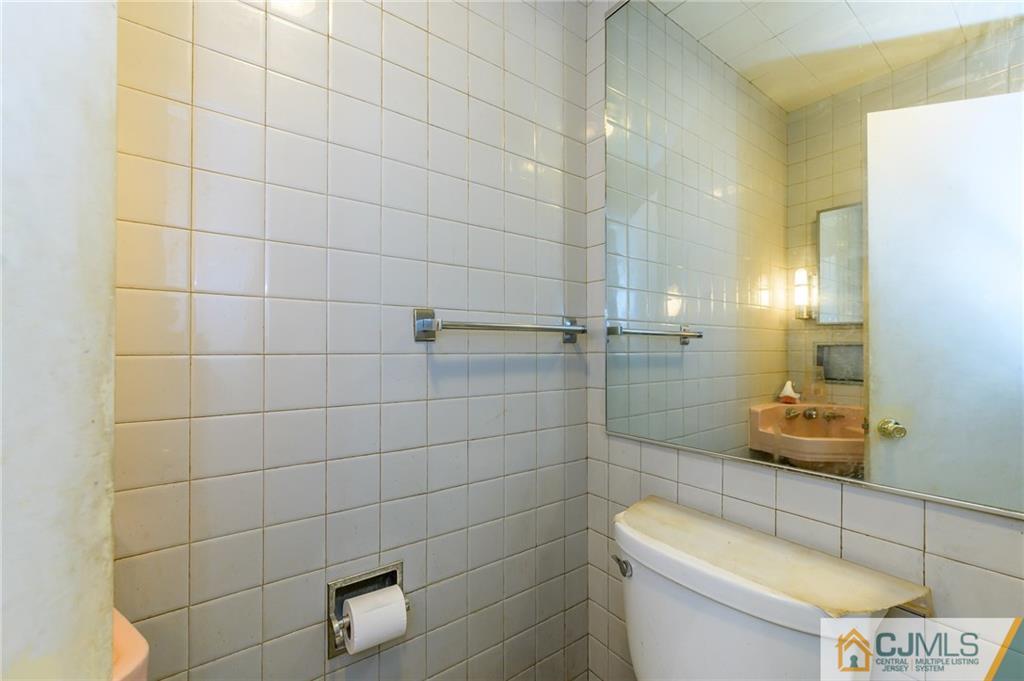 185 Carter Road Princeton, NJ 08540 - Photo 15 of 21 a bathroom with a toilet and shower