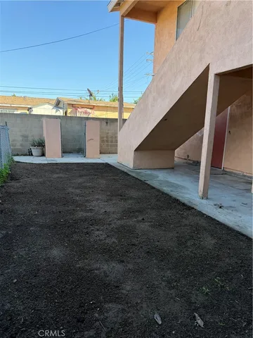 a view of a porch with furniture
