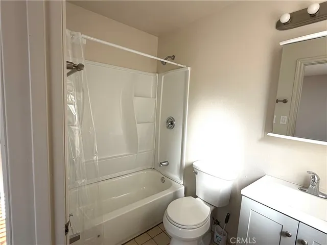 a view of hallway with wooden floor